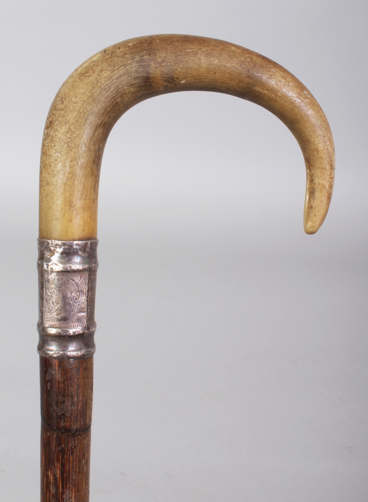 ANOTHER RHINO HORN HANDLED BAMBOO WALKING STICK, with an embossed and hallmarked silver collar, - Image 3 of 5