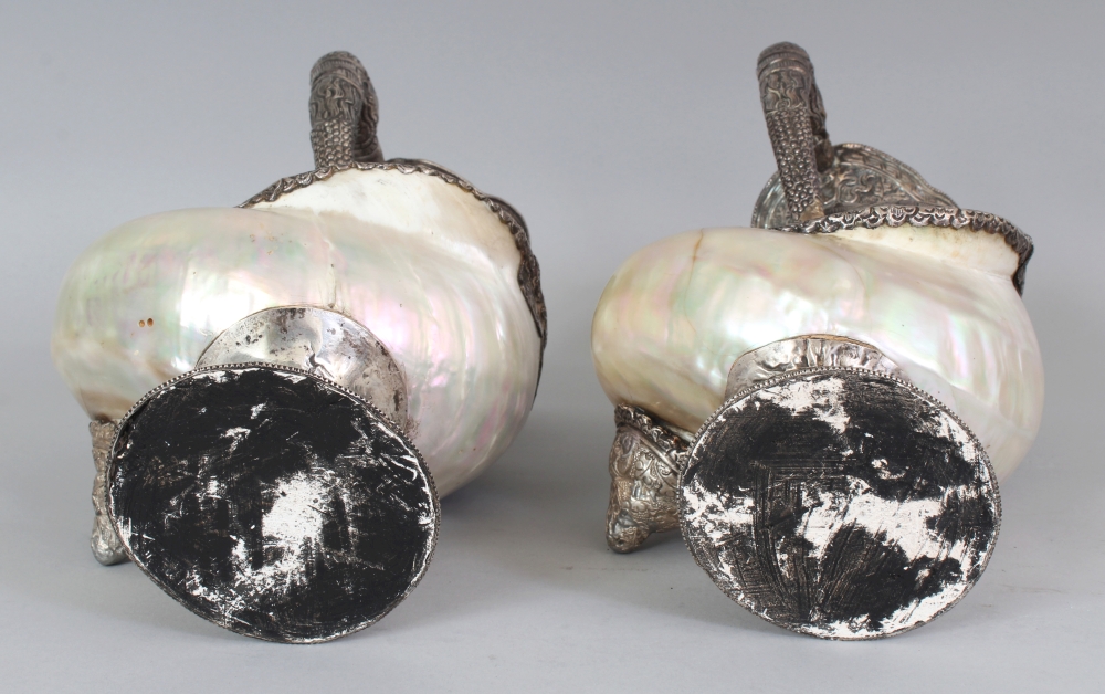 AN UNUSUAL PAIR OF TIBETAN SILVER-METAL MOUNTED NAUTILUS SHELLS, each shell with elaborately - Image 8 of 8