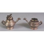 A PAIR OF CHINESE ARCHAIC STYLE MINIATURE SILVER-METAL EWERS, weighing approx. 163gm in total, one