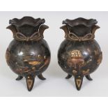 A GOOD PAIR OF JAPANESE MEIJI PERIOD MIXED METAL TRIPOD VASES, each decorated in relief in various