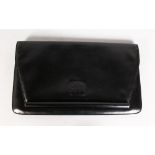 A LOEWE BLACK LEATHER CLUTCH BAG including DUST BAG.