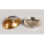 A G.R. ENGRAVED GILT METAL MINIATURE BREAST PLATE with Royal Coat of Arms and a circular ashtray (