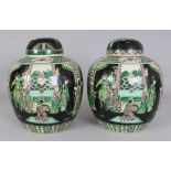 A PAIR OF 19TH CENTURY CHINESE FAMILLE VERTE PORCELAIN JARS & COVERS, each base unglazed, 8.25in