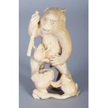 A SMALL JAPANESE MEIJI PERIOD IVORY OKIMONO OF A MONKEY & THREE TOADS, 3.25in high.