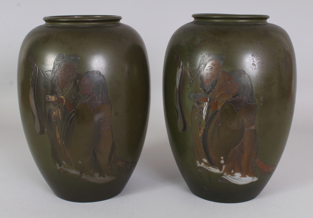 A PAIR OF EARLY 20TH CENTURY SIGNED JAPANESE GREEN GROUND MIXED METAL & INLAID VASES, the side of