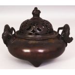 A CHINESE BRONZE CENSER & PIERCED COVER, weighing 1.41Kg, the base cast with a two character