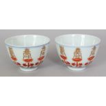 AN UNUSUAL PAIR OF IRON-RED & GILT DECORATED PORCELAIN WINE CUPS, each base with a Yongzheng seal