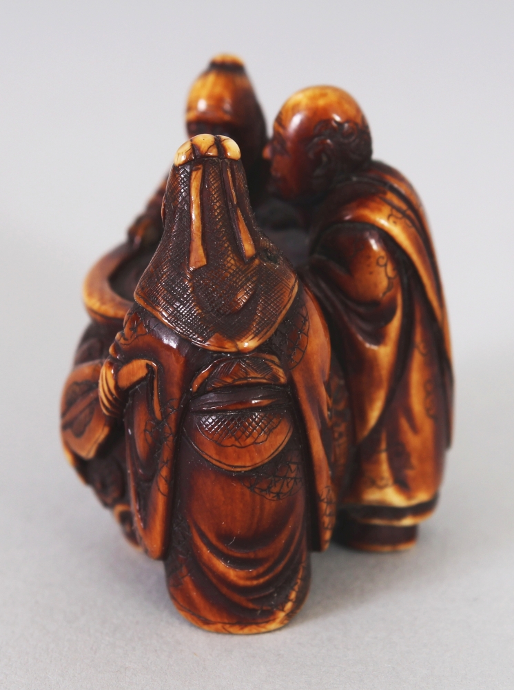 A GOOD QUALITY JAPANESE MEIJI PERIOD STAINED IVORY NETSUKE BY GYOKUZAN, carved in the form of - Image 4 of 6