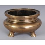 A GOOD SMALL 17TH/18TH CENTURY CHINESE POLISHED BRONZE TRIPOD CENSER, weighing 350gm, 3.6in wide