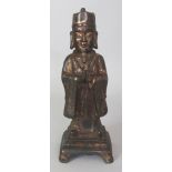 A CHINESE MING STYLE GILT BRONZE FIGURE OF A STANDING OFFICIAL, 12in high.