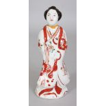 A 17TH/18TH CENTURY JAPANESE IMARI PORCELAIN FIGURE OF A STANDING BIJIN, 6.7in high.