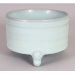 A CHINESE JUN WARE PORCELAIN TRIPOD CENSER, with rib moulded sides, 5.3in diameter at rim & 3.75in