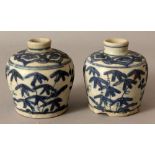 A PAIR OF WANLI PERIOD SHIPWRECK BLUE & WHITE PORCELAIN JARS, each high shouldered ovoid body