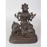 A GOOD CHINESE MING DYNASTY IRON MODEL OF THE BODHISATTVA SAMANTABHADRA SEATED IN LALITASANA ON
