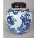 A 19TH CENTURY CHINESE BLUE & WHITE PORCELAIN JAR, together with a fitted carved and pierced wood