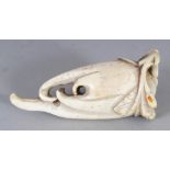 AN EARLY 20TH CENTURY ORIENTAL CARVED IVORY MODEL OF A FINGER CITRON, 2.3in high.