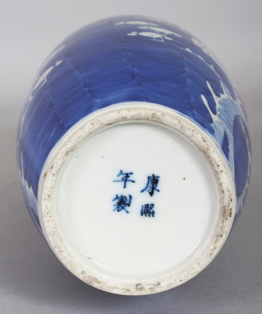 A 19TH CENTURY BLUE & WHITE OVAL FORM PORCELAIN PRUNUS VASE, the base with a four-character Kangxi - Image 7 of 8