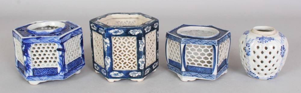 A GROUP OF THREE EARLY 20TH CENTURY JAPANESE BLUE & WHITE PORCELAIN INCENSE POTS, the largest 3.