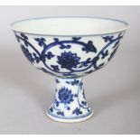 A CHINESE MING STYLE LOTUS DECORATED BLUE & WHITE PORCELAIN STEM BOWL, the base with a six-character