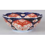 AN EARLY 20TH CENTURY JAPANESE FUKAGAWA IMARI BARBED PORCELAIN BOWL, the base with an orchid mark,