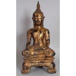 A GOOD 18TH/19TH CENTURY THAI GILT BRONZE FIGURE OF BUDDHA, seated in meditation on a shaped