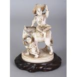 A GOOD QUALITY SIGNED JAPANESE MEIJI PERIOD IVORY OKIMONO OF A FARMER SEATED ON A HORSE, together