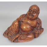 A 19TH/20TH CENTURY CHINESE CARVED HARDWOOD FIGURE OF BUDAI, 8.9in wide & 6.9in high.