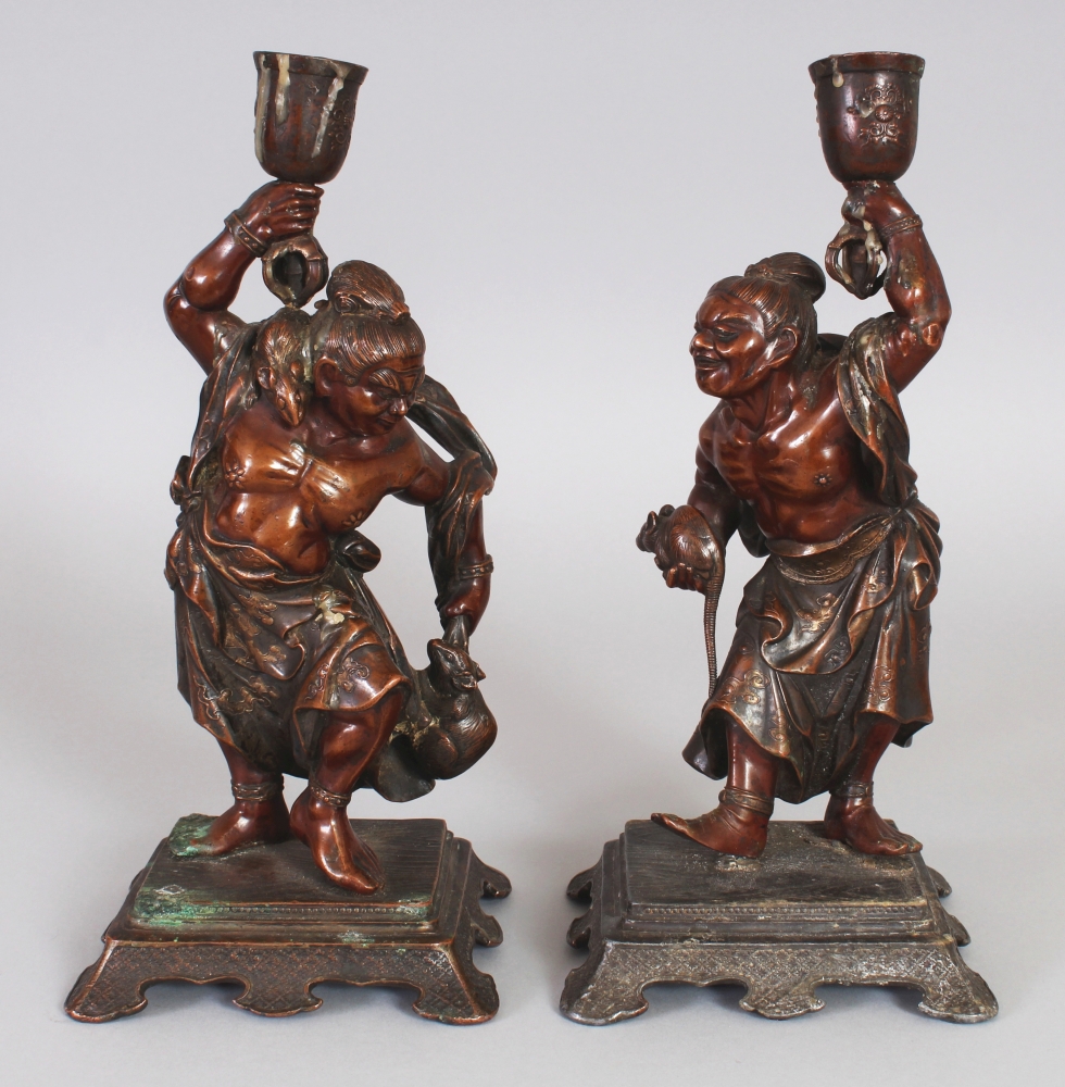 A PAIR OF GOOD QUALITY JAPANESE MEIJI PERIOD MIXED METAL FIGURES OF ONI CANDLESTICKS, each bearing