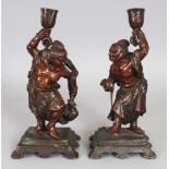 A PAIR OF GOOD QUALITY JAPANESE MEIJI PERIOD MIXED METAL FIGURES OF ONI CANDLESTICKS, each bearing