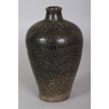 A CHINESE JIZHOU WARE MOTTLED GLAZE CERAMIC VASE, the base unglazed, 6.25in high.