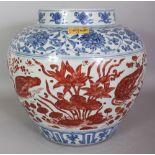 A LARGE GOOD QUALITY CHINESE MING STYLE COPPER-RED & UNDERGLAZE-BLUE PORCELAIN JAR, the base