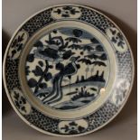 A SIMILAR CHINESE WANLI PERIOD BLUE & WHITE SHIPWRECK PORCELAIN PEACOCK DISH. (from the collection