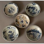 A GROUP OF FIVE VARIOUS CHINESE KANGXI PERIOD SHIPWRECK BLUE & WHITE PORCELAIN SAUCERS, various