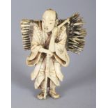 A GOOD QUALITY JAPANESE MEIJI PERIOD IVORY OKIMONO OF A STANDING FAGGOT GATHERER, 2.75in high.