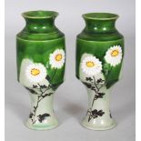 A SMALL PAIR OF EARLY 20TH CENTURY JAPANESE TAIZAN STYLE FLORAL DECORATED GREEN GLAZED EARTHENWARE