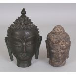 AN 18TH/19TH CENTURY THAI BRONZE HEAD OF BUDDHA, the reverse with an inscription, 5.6in high;