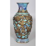 A GOOD 19TH/20TH CENTURY CHINESE TURQUOISE GROUND IMITATION BRONZE MOULDED PORCELAIN VASE, decorated