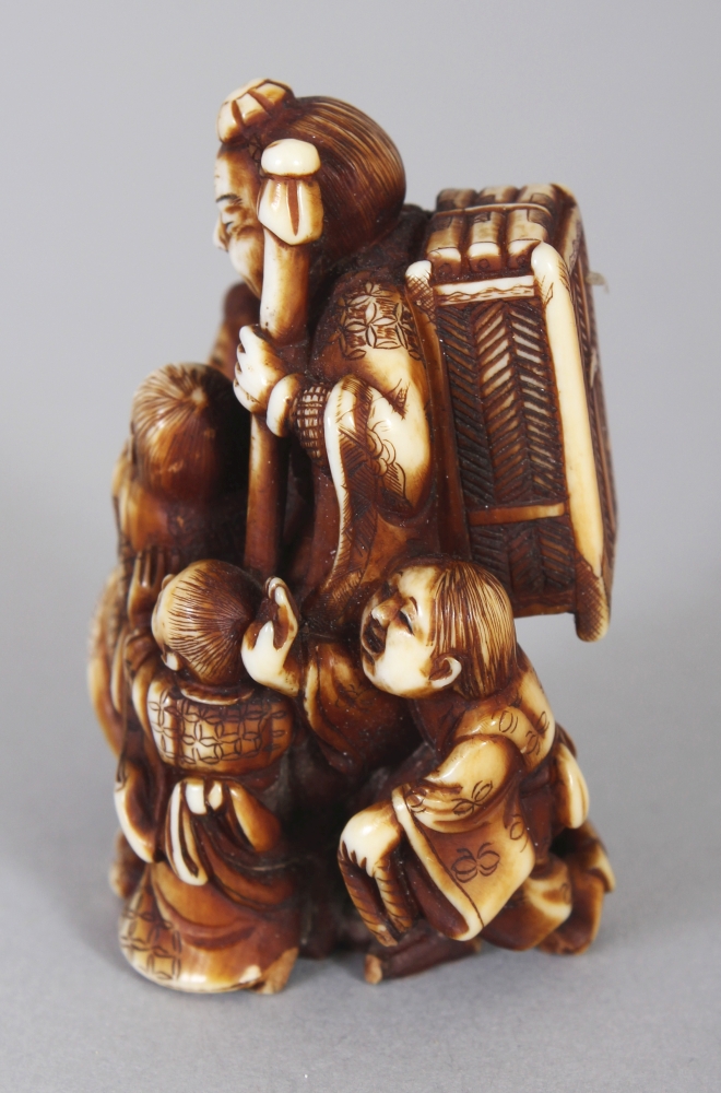 A GOOD QUALITY SIGNED JAPANESE MEIJI PERIOD STAINED IVORY NETSUKE, carved in the form of a - Image 4 of 6