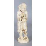 A SIGNED JAPANESE MEIJI PERIOD IVORY OKIMONO OF A STANDING MAN, holding a pipe and a broom, the base