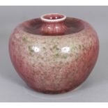A CHINESE PEACH BLOOM PORCELAIN VASE, with a short waisted neck, the base with a Qianlong seal mark,
