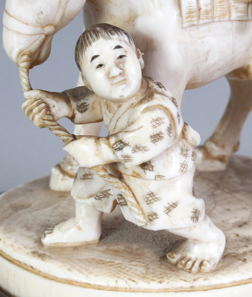 A GOOD QUALITY SIGNED JAPANESE MEIJI PERIOD IVORY OKIMONO OF A FARMER SEATED ON A HORSE, together - Image 6 of 9