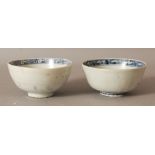 A PAIR OF CHINESE WANLI PERIOD BLUE & WHITE SHIPWRECK PORCELAIN BOWLS, each painted to its centre