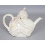 AN ORIENTAL WHITE CRACKLE GLAZED MONKEY FORM PORCELAIN TEAPOT & COVER, 8.5in long including handle