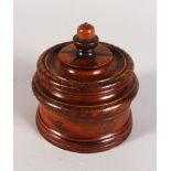 AN 18TH CENTURY TURNED AND INLAID WOOD CIRCULAR TOBACCO JAR AND COVER. 4.5ins diameter.