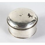 AN EARLY CIRCULAR SILVER BOX AND COVER with makers mark.