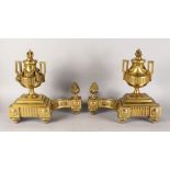A GOOD PAIR OF LOUIS XVI DESIGN GILT BRONZE CHENETS with urn finials and pineapple finials. 1ft 5ins
