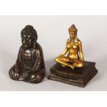 A CHINESE BRONZE BUDDHA, with lift off Buddha opening to reveal a nude seated lady. 5.5ins high.