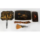 A CARVED WOOD PAPER KNIFE, FACE SCREEN, two trays and table brush.