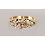 AN 18CT YELLOW GOLD SEVEN STONE DIAMOND RING, 2CTS.