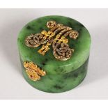 A RARE RUSSIAN FABERGE STYLE GREEN JADE CIRCULAR BOX AND COVER with diamond set gold initials. 2.